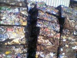 LMS CONSISTING OF USED TIN CAN PRESSED IN BUNDLES $1